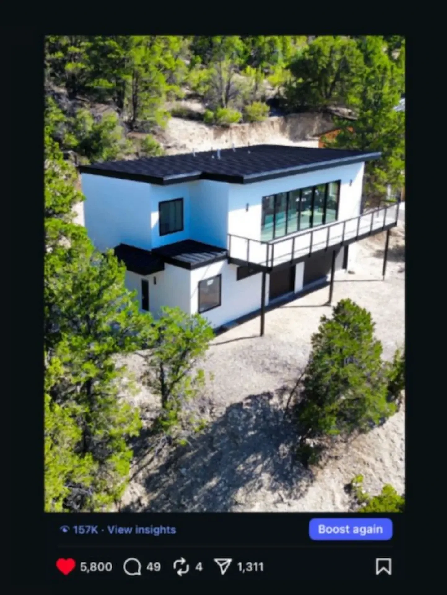 Viral Polaris Modular Instagram post of a mountain home showing 157K views with 5,800 likes and 1,311 shares
